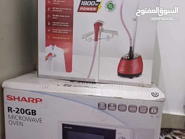ميكرويف وجهاز أوتي بخار جديد