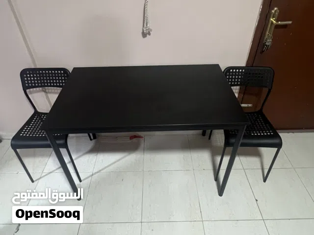 IKEA dining table with 2 chairs for sale