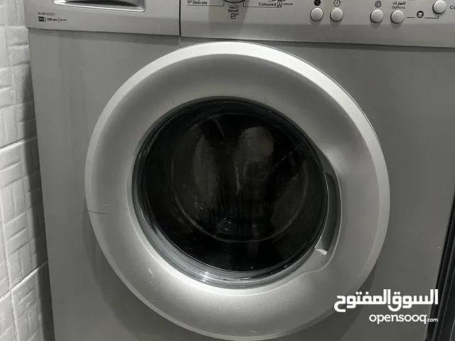 غساله شارب 8 كيلو مستعمله بحاله ممتازه