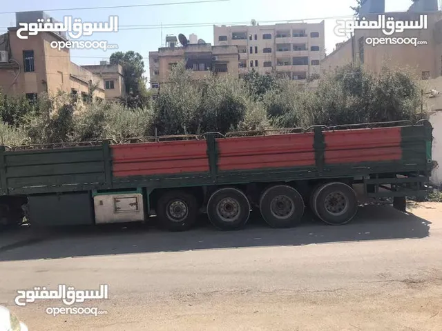 عرباي تريلا اربع محاور اجناب دبلات دنجل بيبي مع سياره فورد للبيع او البدل على سياره حديثه