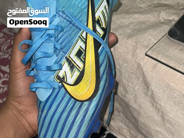 One time used football boots vey good condition wallah and any one pair of gloves also