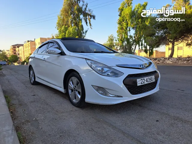 هونداي سوناتا هايبرد وارد أمريكي  موديل 2013 فل الفل بانوراما  لون ابيض لؤلؤة كريستال مميز