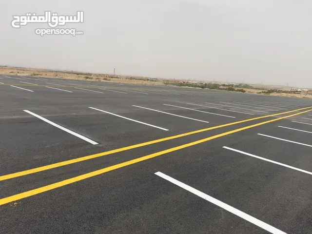تخطيط طرق ومواقف السيارات ومحطات الوقود دهان حار وبارد ودهان بلدورات