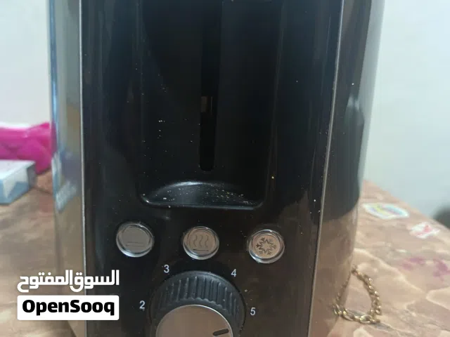 توستر QUIGG ألماني "نظيف جداً" مع ميزة تسخين الخبز - بسعر لقطة!