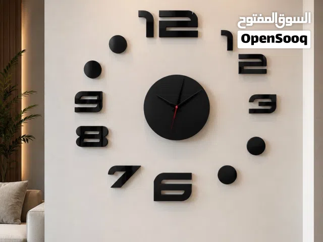 ساعة حائط مودرن سوداء – تصميم ديكوري فاخر للمنازل