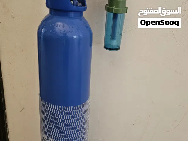 كبسولة اوكسجين مع جهاز  منظم للاوكسجين كامل وجديد غير مستخدم