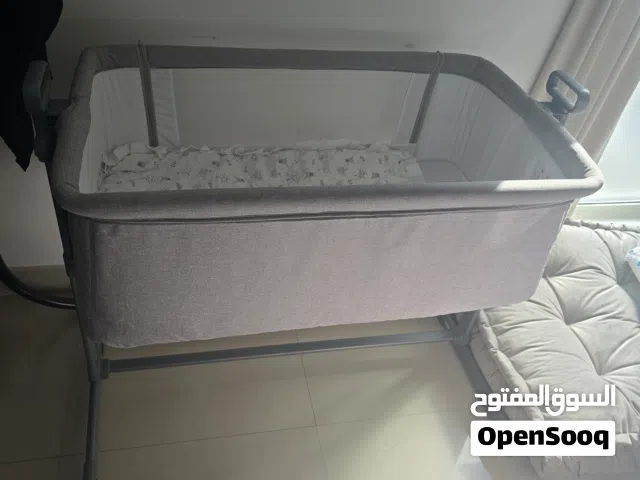 small baby bed fit into small apartment rooms