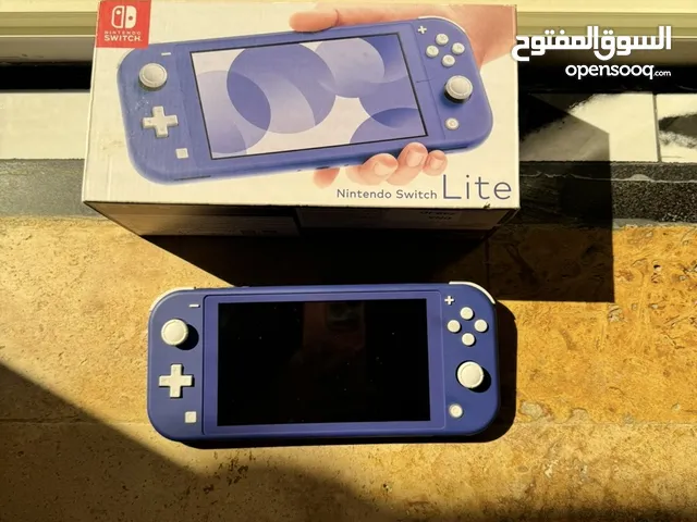 نتيندو سويتش لايت مستعمل جديد مع 3   و بحالة ممتازة العاب و شنطة