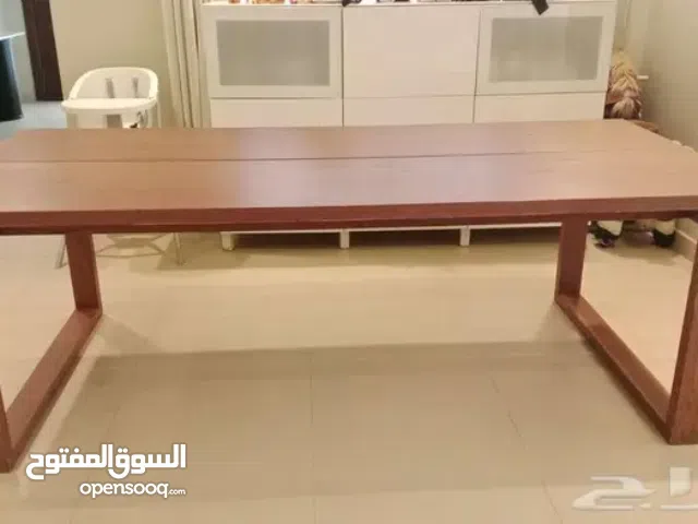 Dining table . A Contemporary Circular Low Coffee Table