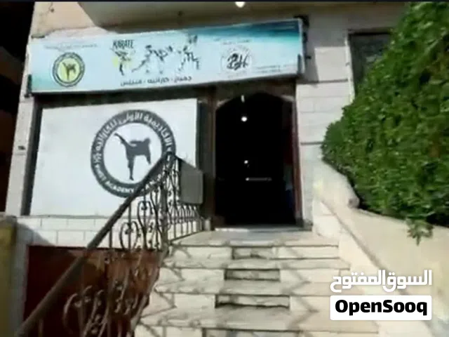 محل تجاري بأكتوبر 130 م