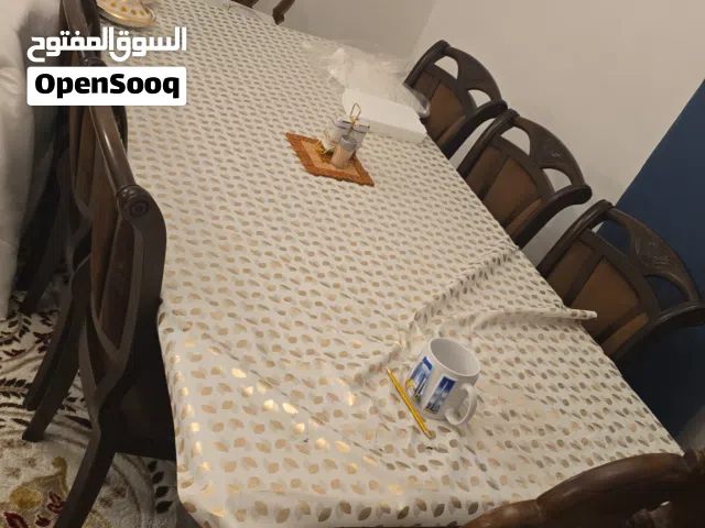 big dining table with 8 chairs.