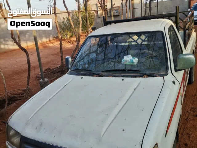 تويوتا هلوكس بلد صنع صين ماشية في عداد 240الف امسقط فاضي محرك استندار