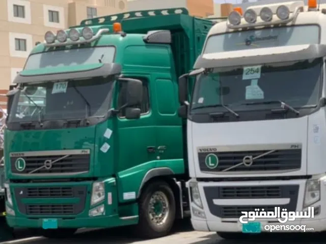 2x Volvo FH 460 (2012) – Powerful, Reliable, Ready for Work with Box. AED 320,000 for both.