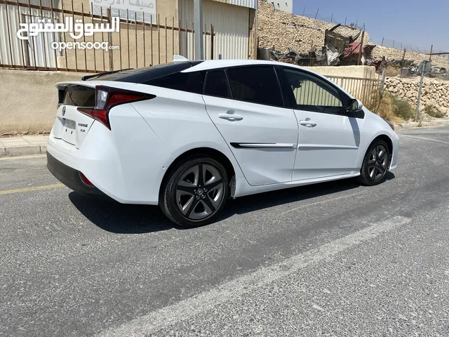 تويوتا بريوس 2022 بطاريه ليثيوم ماشيه 10 الاف 4 جيد حره جمرك جديد باسم المشتري