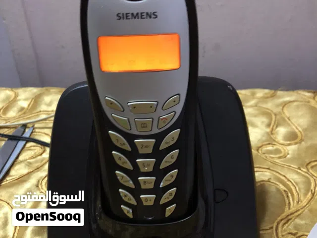 Gigaset A140 very good condition & holder and charger only for Gigaset AL140