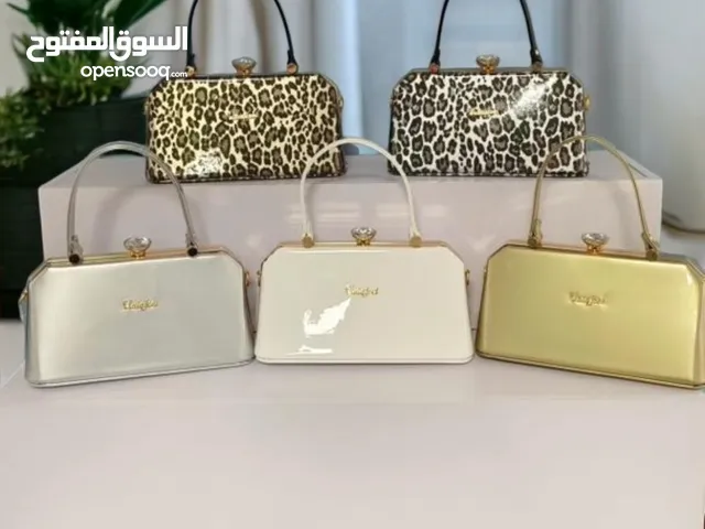 شنط يد شبابيه فخمه لماع + نمري