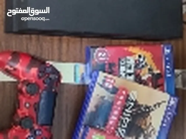playstation 4 with 3 games and one joystick  بلايستيشن 4 used