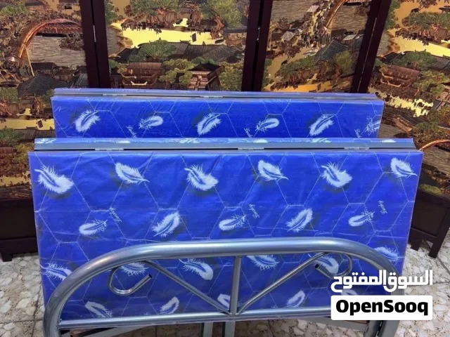 سرير طوي ثقيل