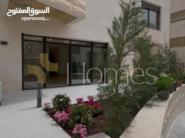 شقة ارضية مع ترس للبيع في الدوار السابع بمساحة بناء 147م
