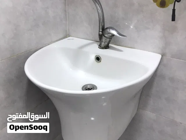 مغسله تعليق