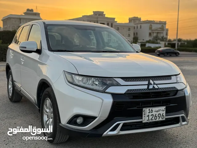 أوتلاندر2019 عداد 122 شرط الفحص جير مكينه شاصي الون الصدفي بي حاله جيده