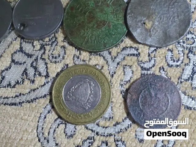 العنوان: "طقم عملات يمنية نادرة (ملكية 1367هـ + جمهورية 1985م)  مع عملات كويتية وبحرينية."