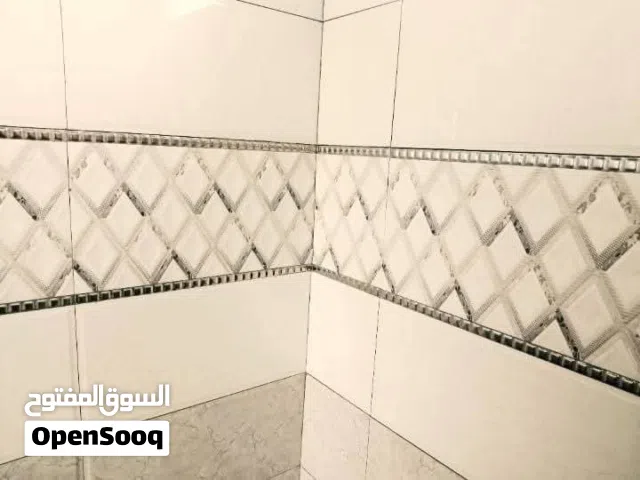بناء لبخ اسود وابيص تغليف سيراميك