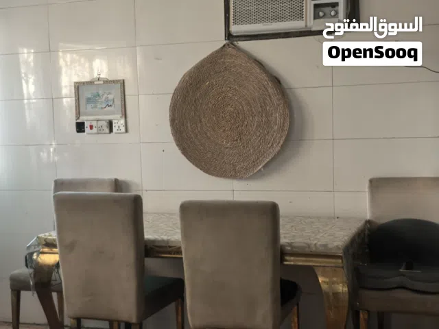 ميز طعام مرمر طبيعي يسع 6 كراسي