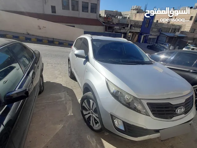 كيا سبورتاج فضي فحص كامل بحالة ممتازة دهان الشركه