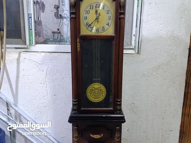 ساعه عموديه ام بندول تشتغل عا بطاريه