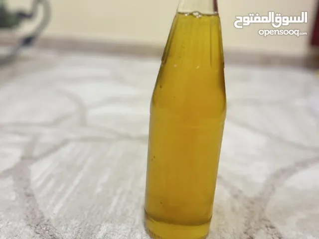 بيع غرشة عسل ابو طويق بلون الاصفر الشفاف كما واضح فالصورة