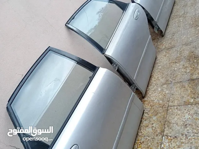 قطع غيار مازدا 626 اربع ابواب طقم جنط باب شنطه تابلو رفرف كراسي الصالوأن