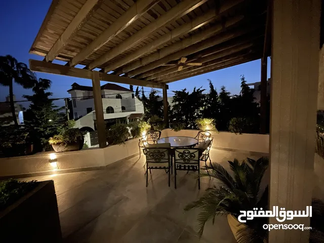 Furnished One bedroom large loft over a villa with large terrace.