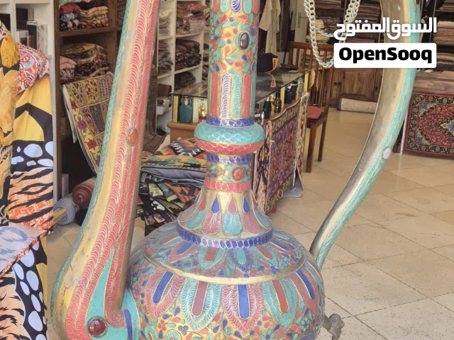 Colors: Vibrant, intricate patterns in shades of blue, red, gold, and green.