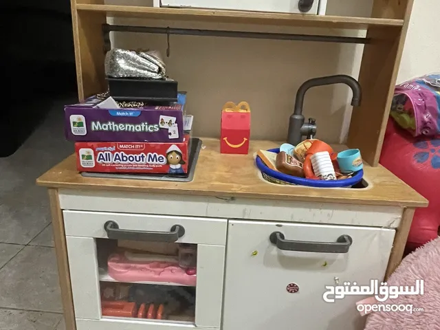 A children's kitchen with some toys