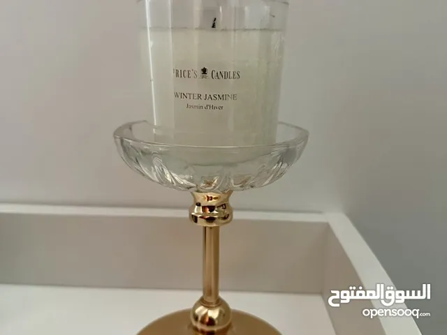 وسادة راقية وساعة ولوحات واكسسوارات للبيت