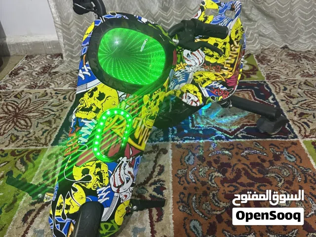 سكوتر درفت كهربائي 36 فولت للأطفال - تصميم جرافيتي مميز وإضاءة LED