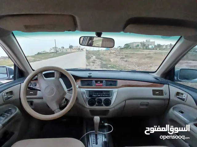 ميتسوبيشي لانسر 2004 مواصفات خليجي