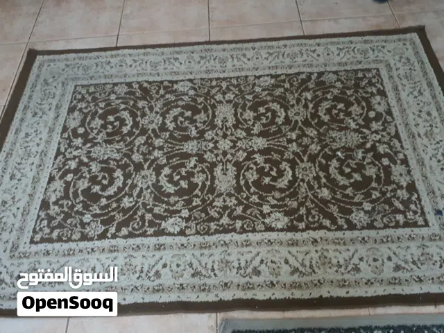 سجاده لون  بني منقوش