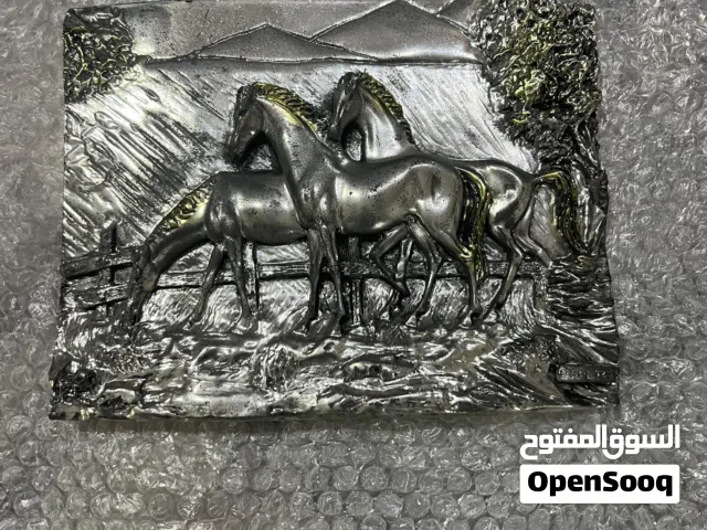 لوحة من الحجر ملبسه بالفضه عيار 925