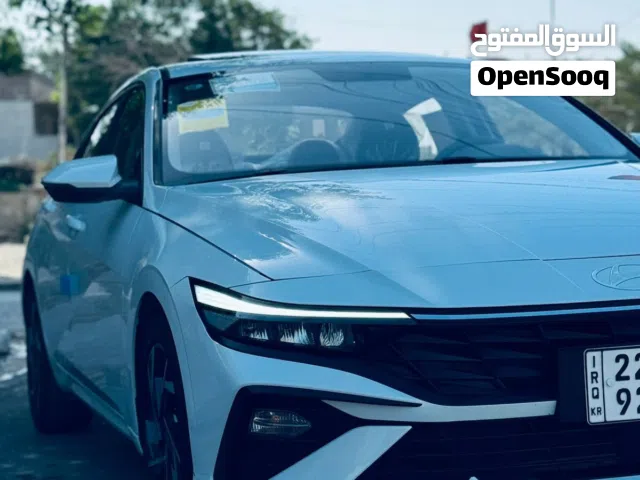 النترا فول لون ابيض بصمة وفتحة رقم اربيل ماشية 24 الف جاهزه بدون صبغ وبارد مكفولة مكان السيارة بغدا