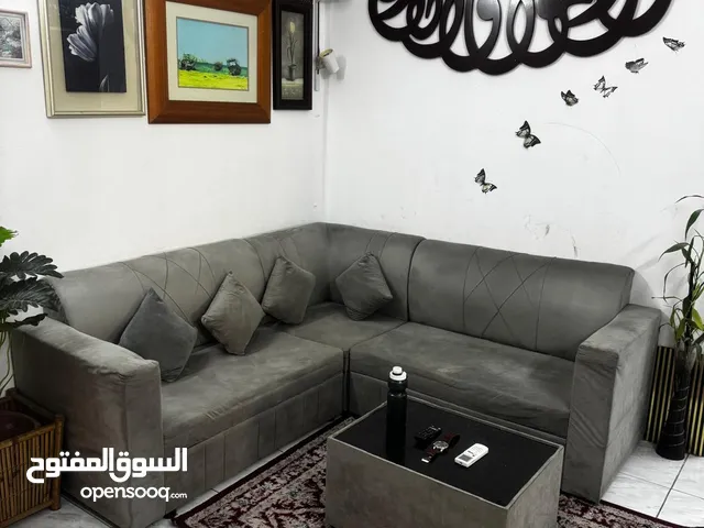 sofa grey colour( L connection type, 3 two seater and 1 connector, one coffee table )