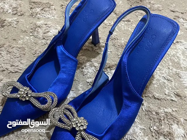 Blue With Heels in Amman