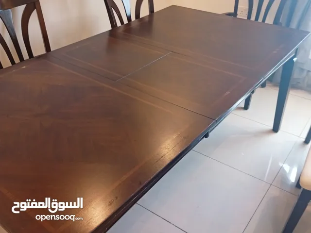 طاوله طعام تتكبر وتصغر