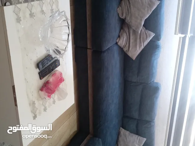 طقم كورنر 9 مقاعد مع بفه وطاولة وسط بيضا