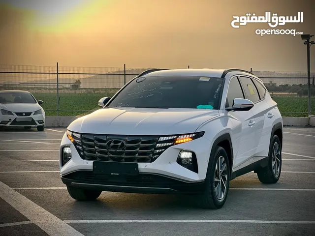 توسان هايبرد 2022 فل مسكر بدون فتحة فرش بني