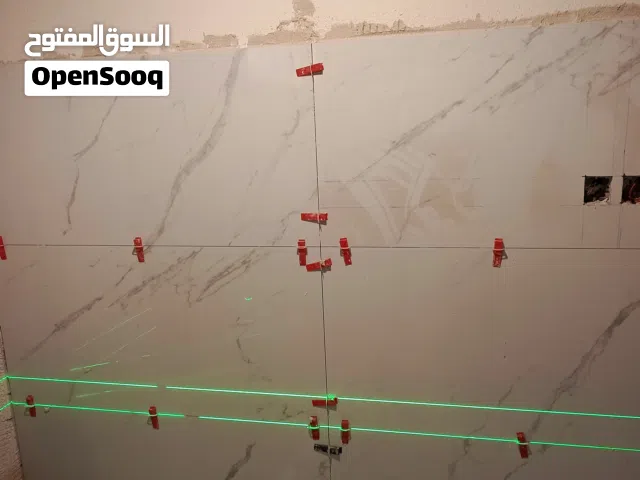 مبلط بلاط سيرامك بورسلان رخام باركيه انترلوك بلدوره رسيف ترميم حمامات مطبخ كل شيء