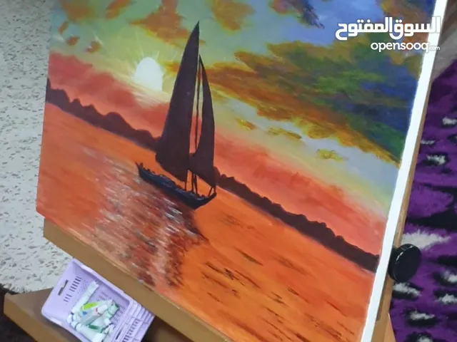 لوحة للبحر وقت غروب الشمس