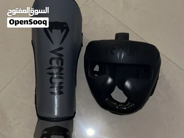 Kick boxing shinguard and helmet