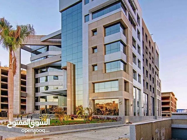 بناية تجارية على شارع عام في الاعظمية للبيع مساحة 418 متر